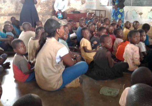 Teacher with students