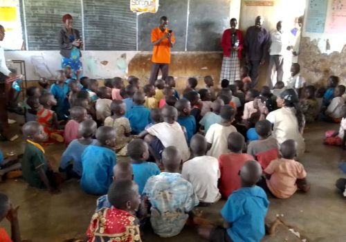 Teacher with students