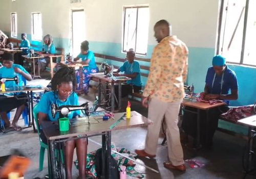 Teacher with students